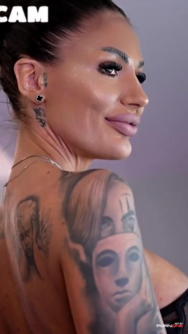 Tattooed Milf Sizzles in Black Lace Lingerie