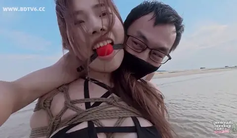 Tied Up: Beach Bondage with a Twist