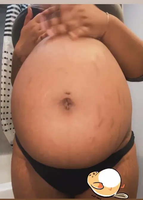 Ebony Stuffed Belly Full Scene