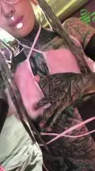 Tattooed Beauty in Fur Lingerie Enjoys Solo Play