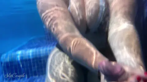 Risky Handjob in Hotel Pool with Big Tits