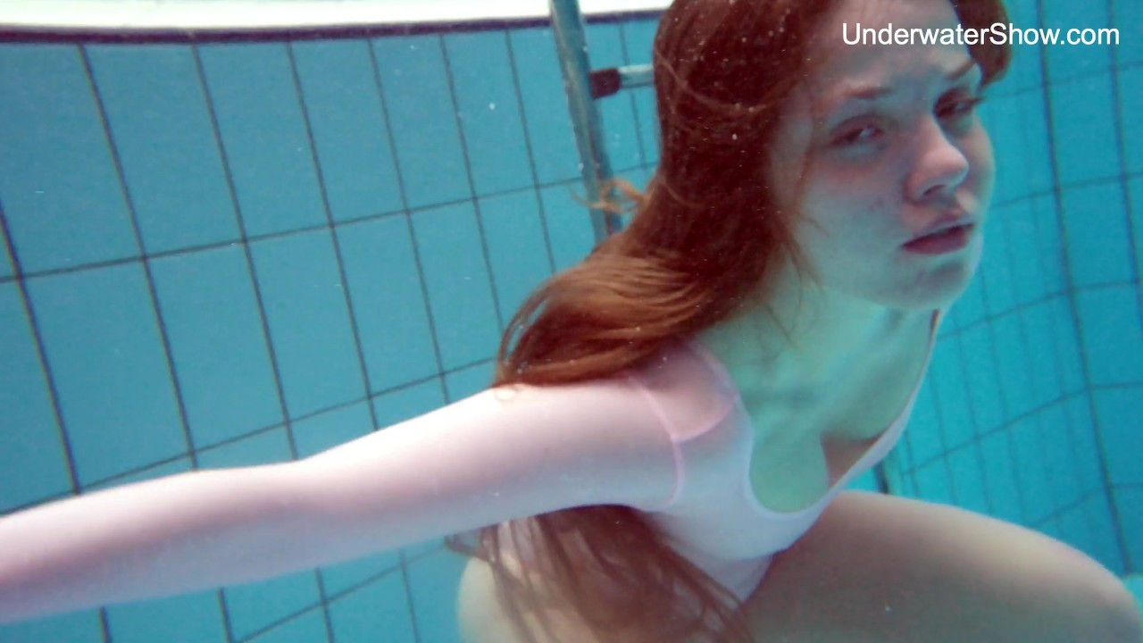 Underwater Seduction with Redhead Simonna