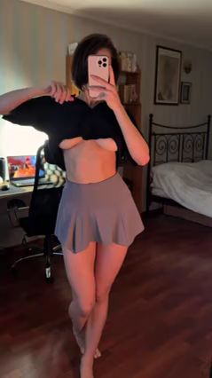 Black Top Tease: Seductive Strip in 17 Seconds