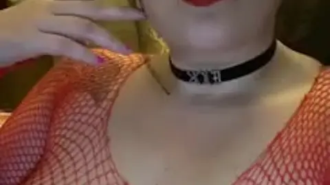Sultry Smoking Fetish Model Exposed Topless