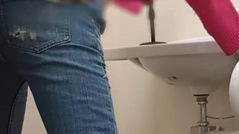 Busty Asian Gal Goes Wild in Multi-Purpose Toilet