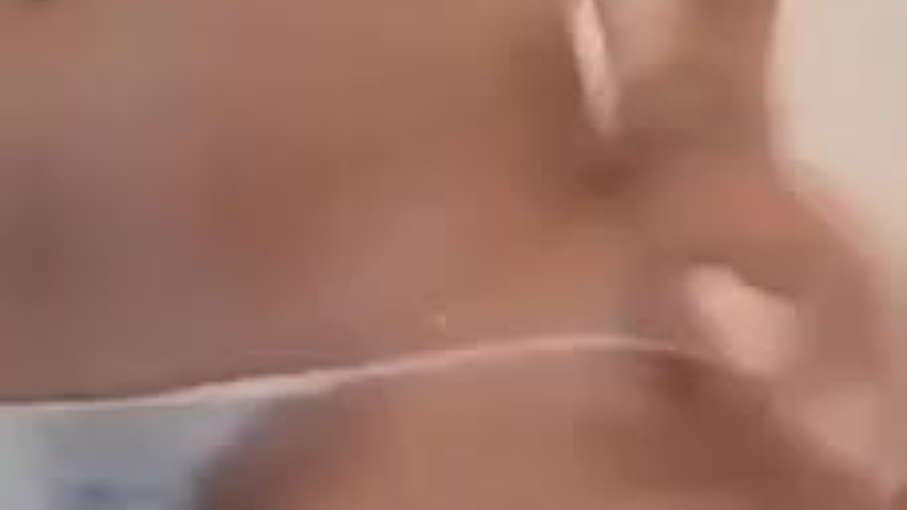 Tattooed MILF Strips Down in Sensual Video