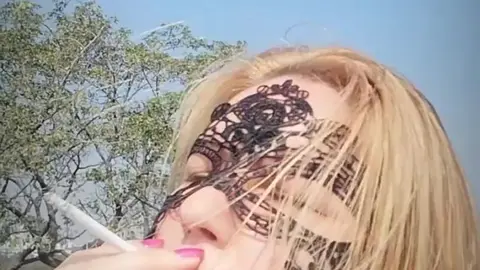 Smoking Blonde Babe: Inexperienced Smoker Tries Slim Cigarette