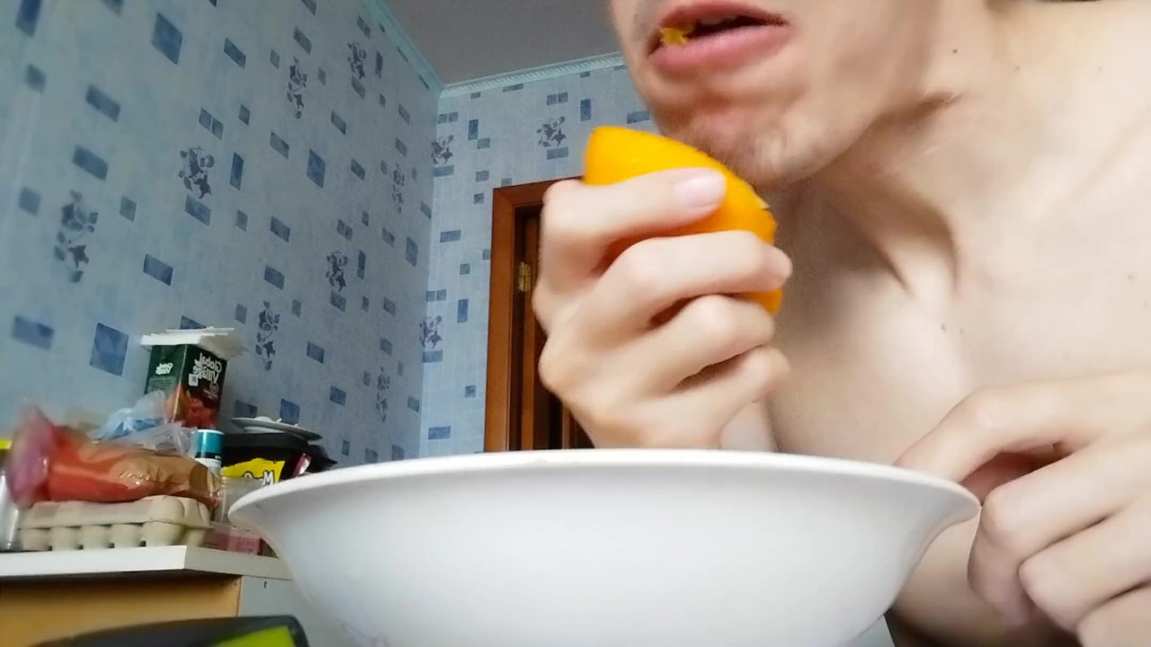 Sensual Orange Eating Experience Unveiled