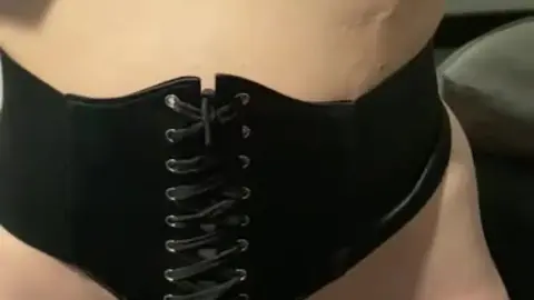 Leather Bound Beauty in Chains Unleashed