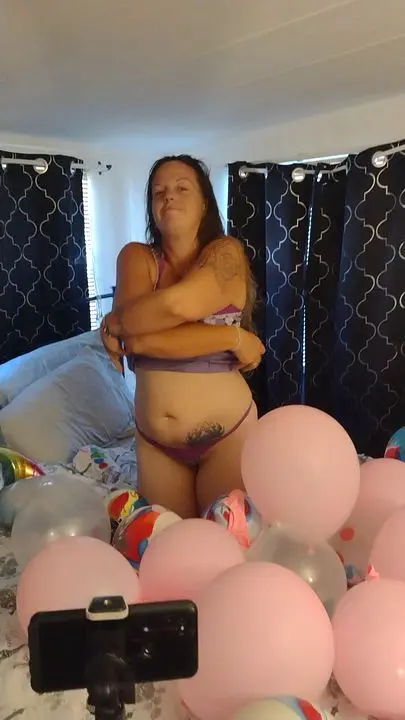 POV Sister-in-Law in Bed with Balloons Reveals Perky Nipples & Strips